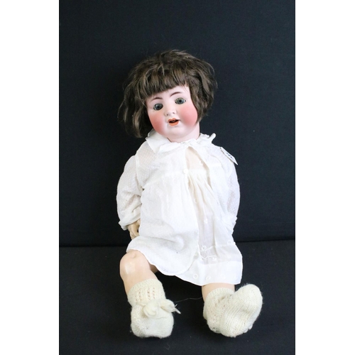 276 - Five early 20th century bisque headed dolls, clothed, with sleeping eyes, composition limbs & painte... 