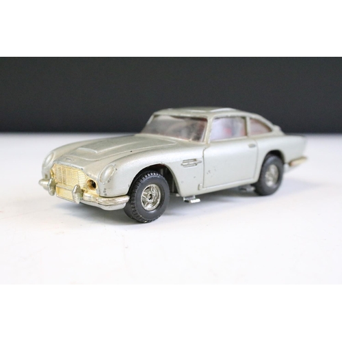 220A - Two unboxed Corgi film related diecast models to include James Bond 007 Aston Martin DB5 and Batman ... 