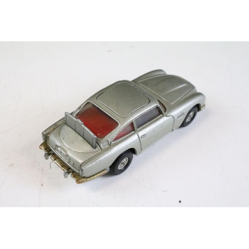 220A - Two unboxed Corgi film related diecast models to include James Bond 007 Aston Martin DB5 and Batman ... 