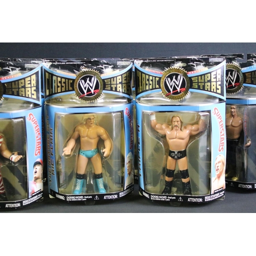 303 - WWF WWE Wrestling - 14 Boxed / carded Jakks Pacific Classic Superstars figures to include The Rock, ... 