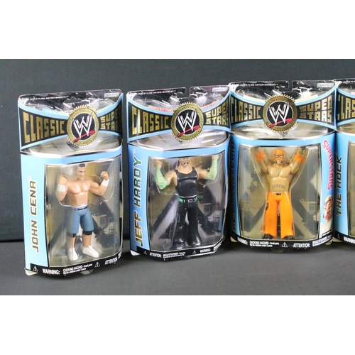 303 - WWF WWE Wrestling - 14 Boxed / carded Jakks Pacific Classic Superstars figures to include The Rock, ... 