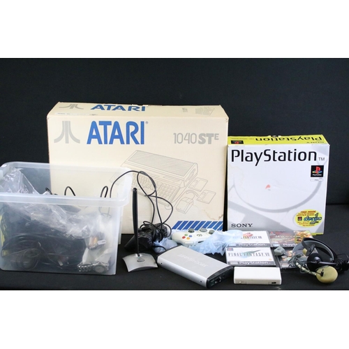 308 - Retro Gaming - Boxed Atari 1040 STE console, a boxed Sony Playstation PS1 with 4 x cased games (Tomb... 