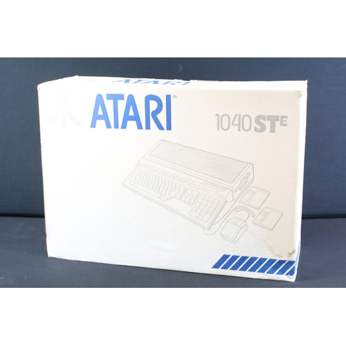 308 - Retro Gaming - Boxed Atari 1040 STE console, a boxed Sony Playstation PS1 with 4 x cased games (Tomb... 