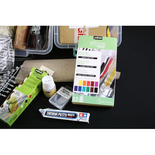 323 - Collection of model kit accessories to include various paints, scenery parts, plastic figures and pa... 