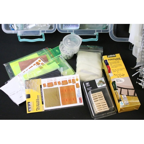 323 - Collection of model kit accessories to include various paints, scenery parts, plastic figures and pa... 