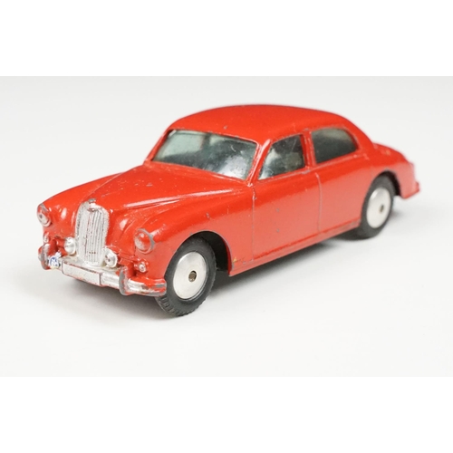 182 - Four boxed Corgi diecast models to include 238 Jaguar Mark X in metallic cerise with lemon interior,... 