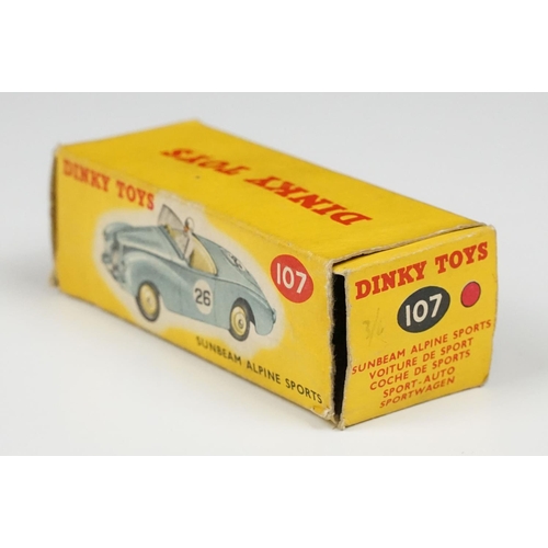 197 - Three boxed Dinky diecast model racing cars to include 111 Triumph TRS Sports in turquoise with red ... 