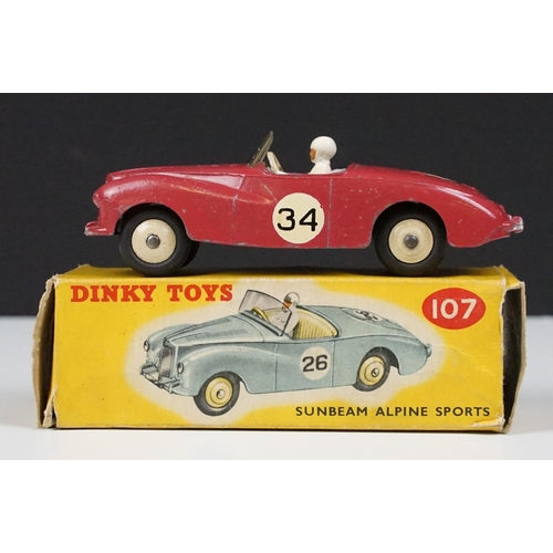 197 - Three boxed Dinky diecast model racing cars to include 111 Triumph TRS Sports in turquoise with red ... 