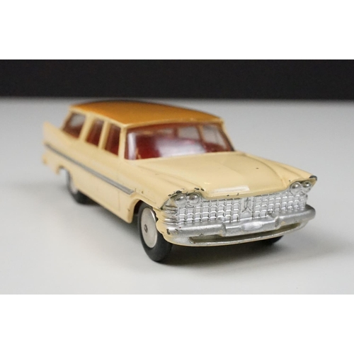 201 - Two boxed Corgi diecast models to include 219 Plymouth Sports Suburban Station Wagon in cream with f... 