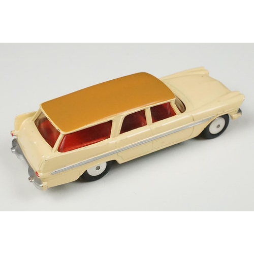 201 - Two boxed Corgi diecast models to include 219 Plymouth Sports Suburban Station Wagon in cream with f... 