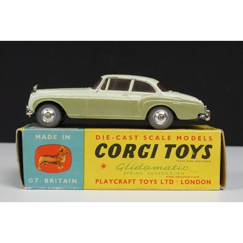 201 - Two boxed Corgi diecast models to include 219 Plymouth Sports Suburban Station Wagon in cream with f... 