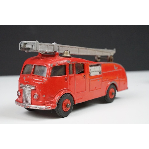 201A - Two boxed Dinky 955 Fire Engine diecast models in box variants, yellow box example shows play wear a... 