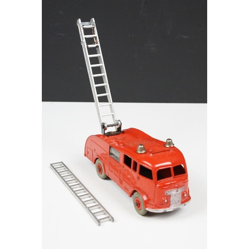 201A - Two boxed Dinky 955 Fire Engine diecast models in box variants, yellow box example shows play wear a... 