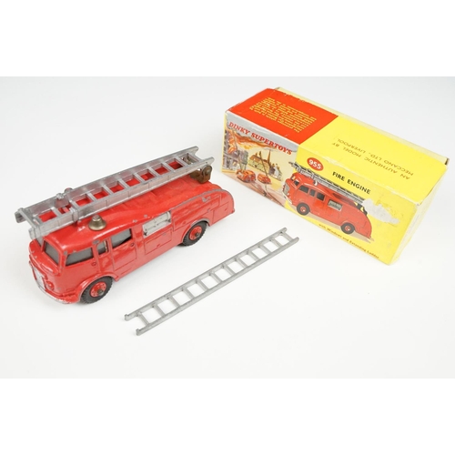 201A - Two boxed Dinky 955 Fire Engine diecast models in box variants, yellow box example shows play wear a... 