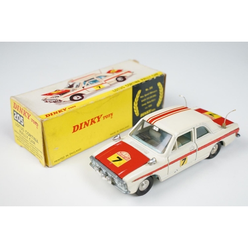 214 - Two boxed Dinky diecast models to include 168 Ford Escort in metallic red with white interior (dieca... 