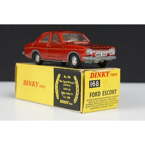 214 - Two boxed Dinky diecast models to include 168 Ford Escort in metallic red with white interior (dieca... 