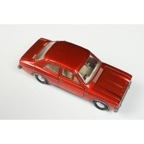 214 - Two boxed Dinky diecast models to include 168 Ford Escort in metallic red with white interior (dieca... 