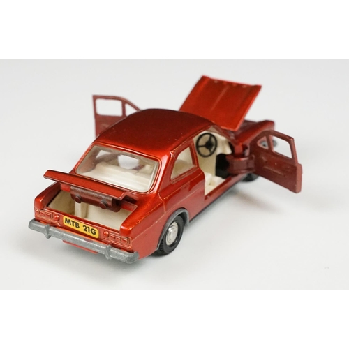 214 - Two boxed Dinky diecast models to include 168 Ford Escort in metallic red with white interior (dieca... 