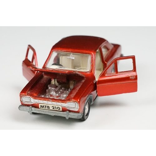 214 - Two boxed Dinky diecast models to include 168 Ford Escort in metallic red with white interior (dieca... 