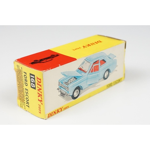 214 - Two boxed Dinky diecast models to include 168 Ford Escort in metallic red with white interior (dieca... 