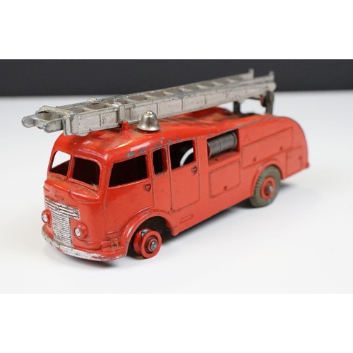 224 - Two boxed Dinky diecast models to include 27AK Farm Tractor & Hay Rake and 955 Fire Engine, both wit... 