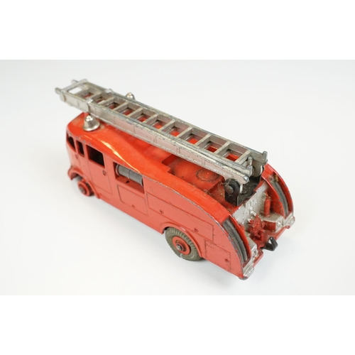 224 - Two boxed Dinky diecast models to include 27AK Farm Tractor & Hay Rake and 955 Fire Engine, both wit... 