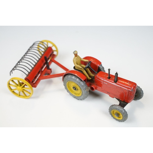 224 - Two boxed Dinky diecast models to include 27AK Farm Tractor & Hay Rake and 955 Fire Engine, both wit... 