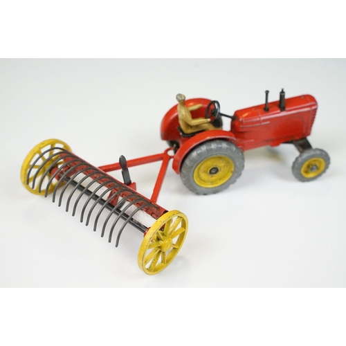 224 - Two boxed Dinky diecast models to include 27AK Farm Tractor & Hay Rake and 955 Fire Engine, both wit... 