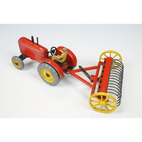 224 - Two boxed Dinky diecast models to include 27AK Farm Tractor & Hay Rake and 955 Fire Engine, both wit... 