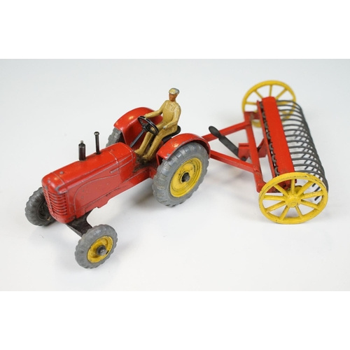 224 - Two boxed Dinky diecast models to include 27AK Farm Tractor & Hay Rake and 955 Fire Engine, both wit... 