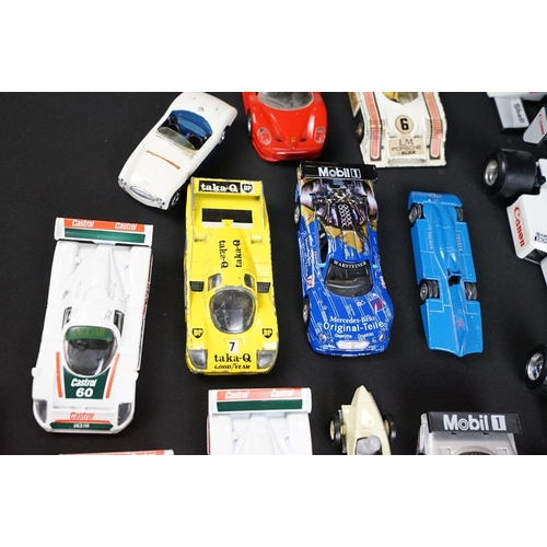 133 - Around 30 diecast model racing cars to include Corgi, Burago, Onyx etc, condition varies with some p... 