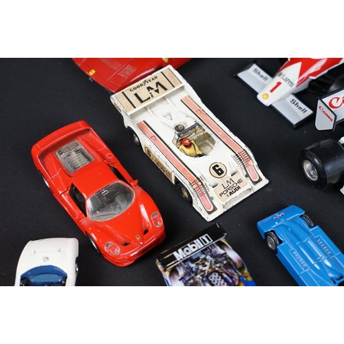 133 - Around 30 diecast model racing cars to include Corgi, Burago, Onyx etc, condition varies with some p... 