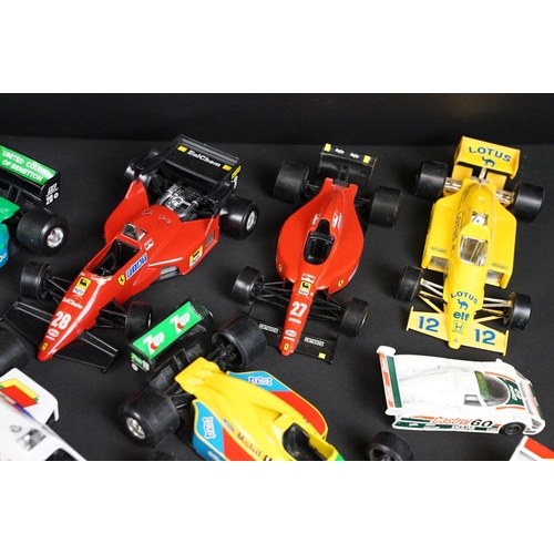 133 - Around 30 diecast model racing cars to include Corgi, Burago, Onyx etc, condition varies with some p... 