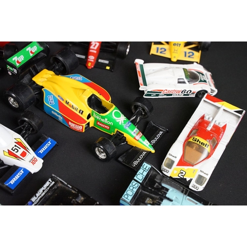 133 - Around 30 diecast model racing cars to include Corgi, Burago, Onyx etc, condition varies with some p... 