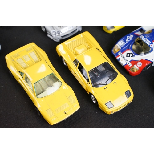 133 - Around 30 diecast model racing cars to include Corgi, Burago, Onyx etc, condition varies with some p... 