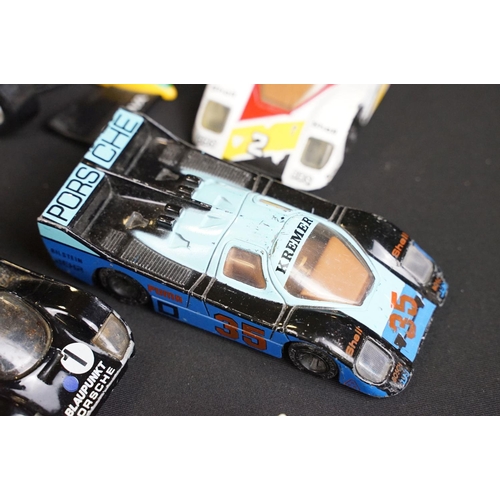 133 - Around 30 diecast model racing cars to include Corgi, Burago, Onyx etc, condition varies with some p... 