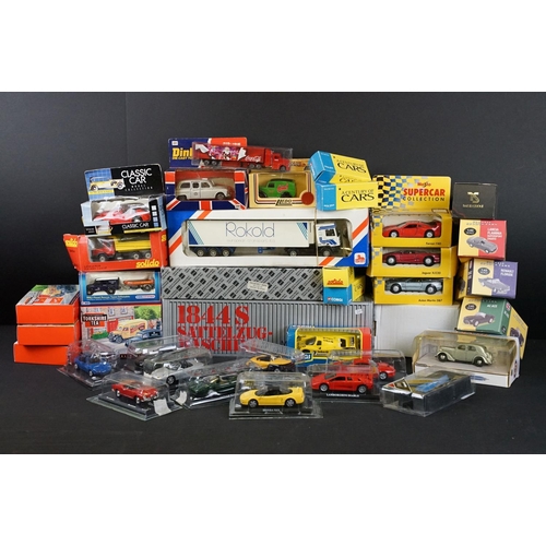 140 - Around 34 boxed diecast models to include Conrad 3120, Atlas, Corgi, Lion Toys etc, diecast ex, boxe... 