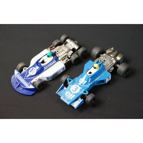 146 - Nine play worn slot cars to include 2 x Scalextric (C129 March 771 & C121 Tyrrell), International 32... 