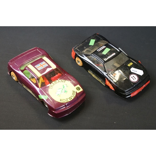 146 - Nine play worn slot cars to include 2 x Scalextric (C129 March 771 & C121 Tyrrell), International 32... 