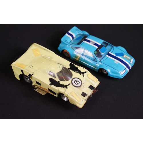 146 - Nine play worn slot cars to include 2 x Scalextric (C129 March 771 & C121 Tyrrell), International 32... 