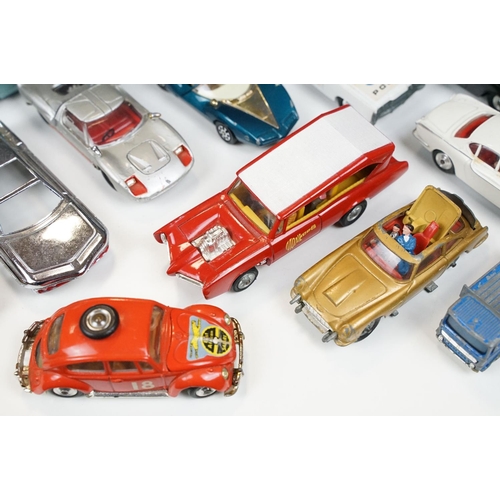 172 - Over 30 mid 20th C play worn diecast models to include Corgi, Dinky and Matchbox featuring many TV r... 