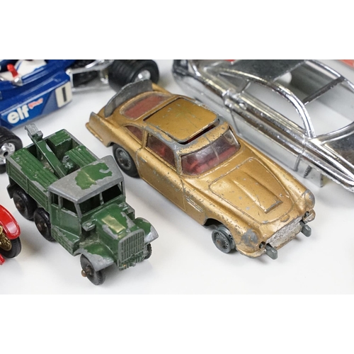 172 - Over 30 mid 20th C play worn diecast models to include Corgi, Dinky and Matchbox featuring many TV r... 