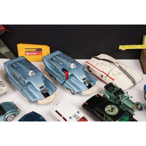 172 - Over 30 mid 20th C play worn diecast models to include Corgi, Dinky and Matchbox featuring many TV r... 