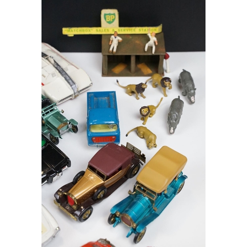 172 - Over 30 mid 20th C play worn diecast models to include Corgi, Dinky and Matchbox featuring many TV r... 