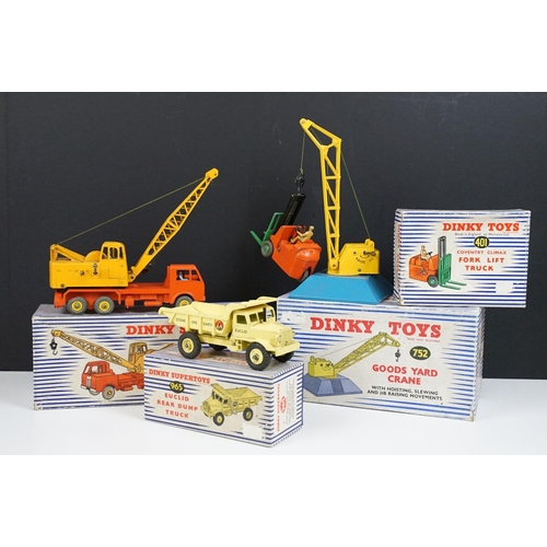 174 - Four boxed Dinky diecast construction models to include 401 Coventry Climax Fork Lift Truck, 965 Euc... 