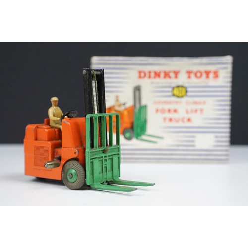 174 - Four boxed Dinky diecast construction models to include 401 Coventry Climax Fork Lift Truck, 965 Euc... 