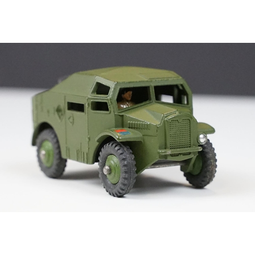 246 - Two boxed Dinky military diecast models to include 660 Tank Transporter and 697 25 Pounder Field Gun... 