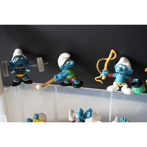 392 - Approx 96 Peyo / Schleich Smurfs figures including Windsurfer Smurf, Astronomer Smurf, Pizza Smurf e... 