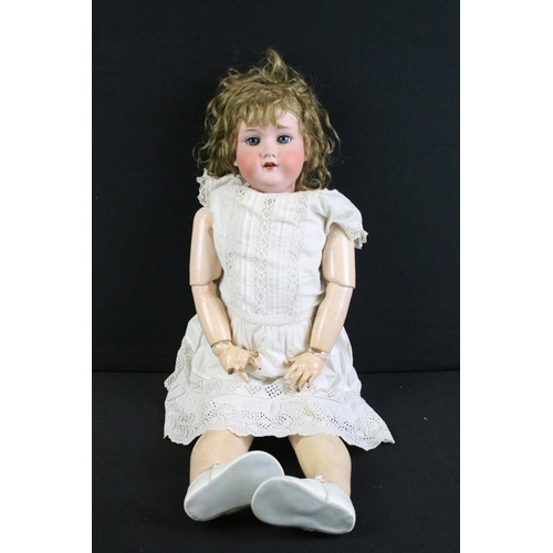 282 - Six early 20th C Armand Marseille bisque headed dolls with sleeping eyes, jointed composition limbs,... 