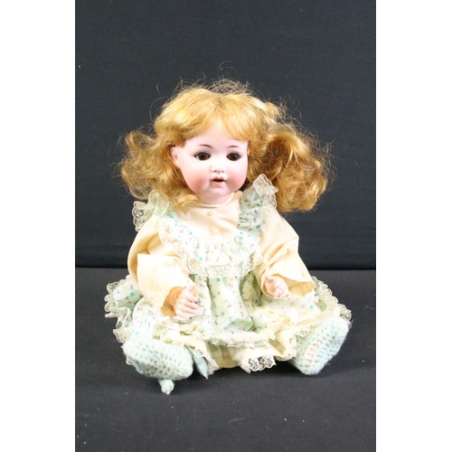 282 - Six early 20th C Armand Marseille bisque headed dolls with sleeping eyes, jointed composition limbs,... 